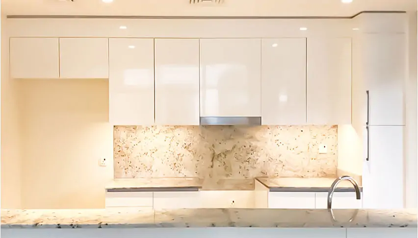 Kitchen in Dubai Hills Before Renovation White matte was used for wrapping.